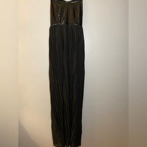 Never worn. Strapless jumpsuit. Black with faux leather top.